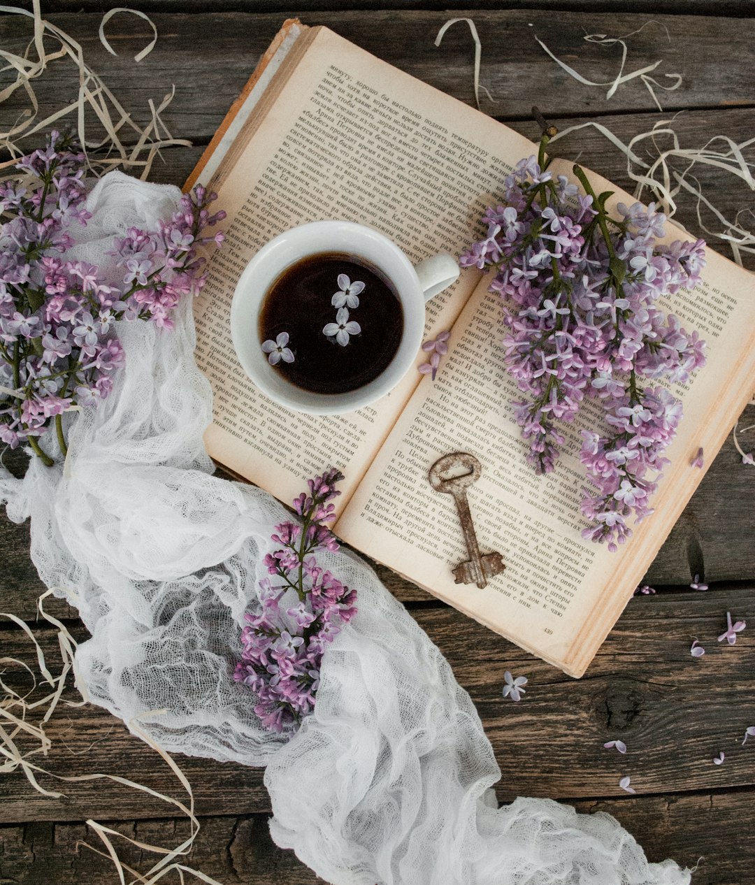 white coffee cup on book