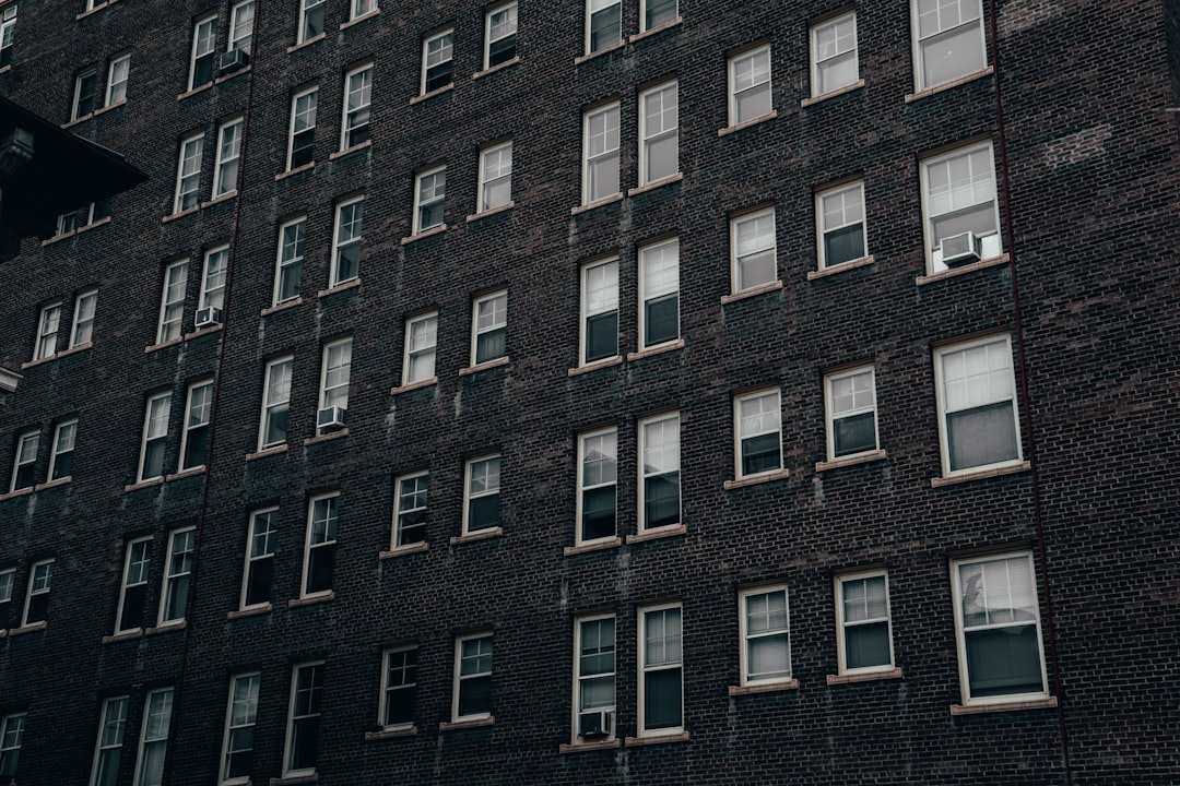 grayscale photo of gray and black building