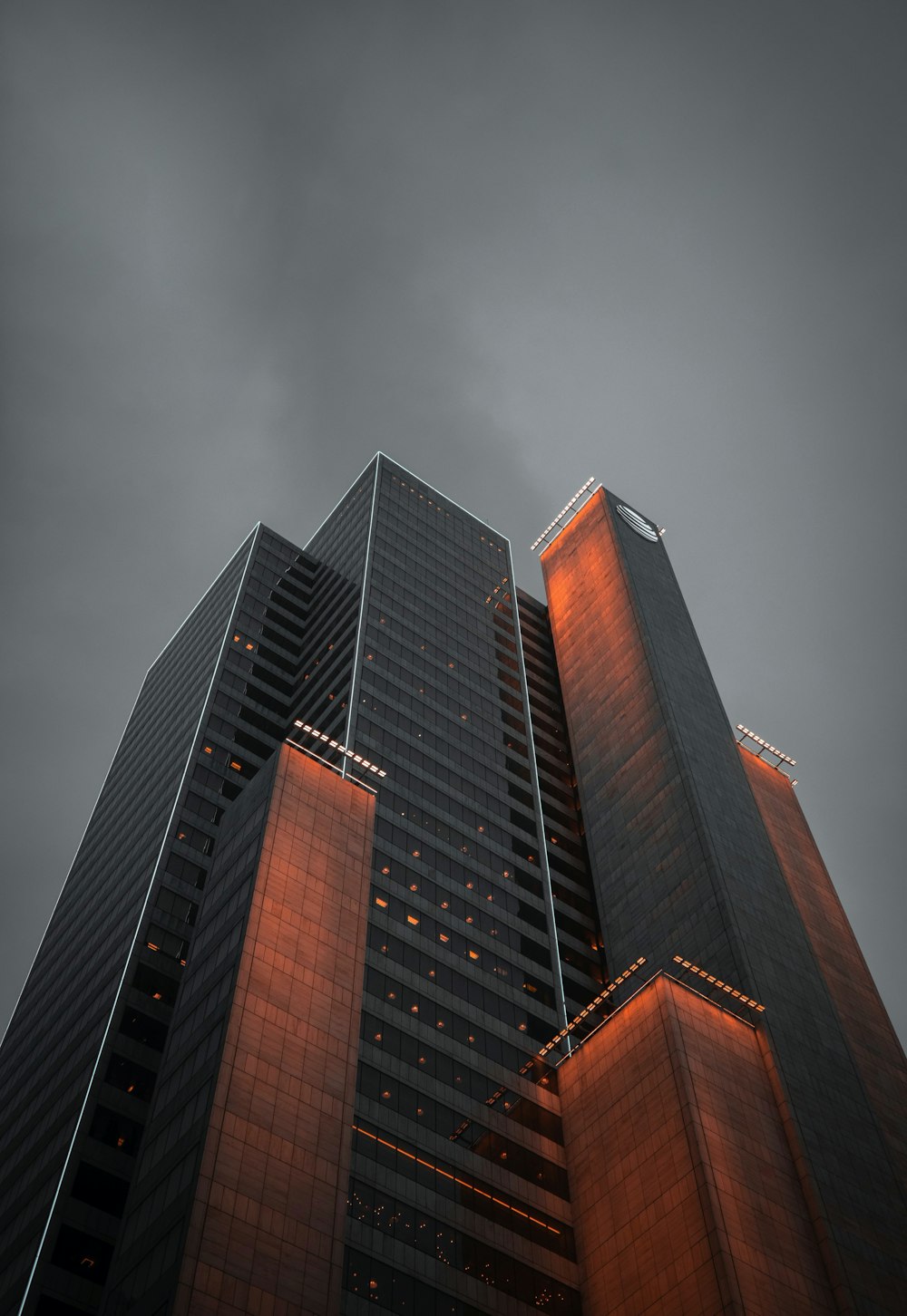 black and brown curtained-glass building