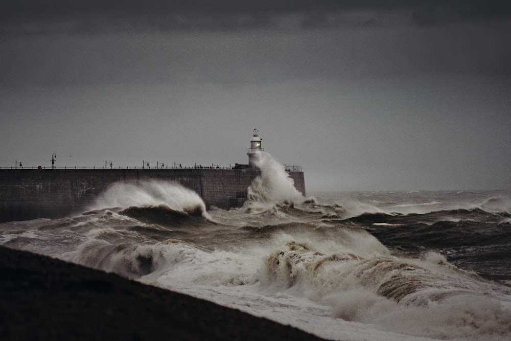 waves crashing on wall