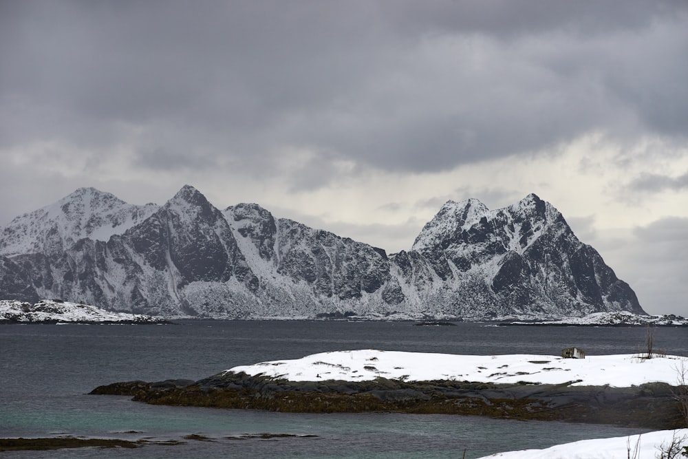 glacier mountains island during day