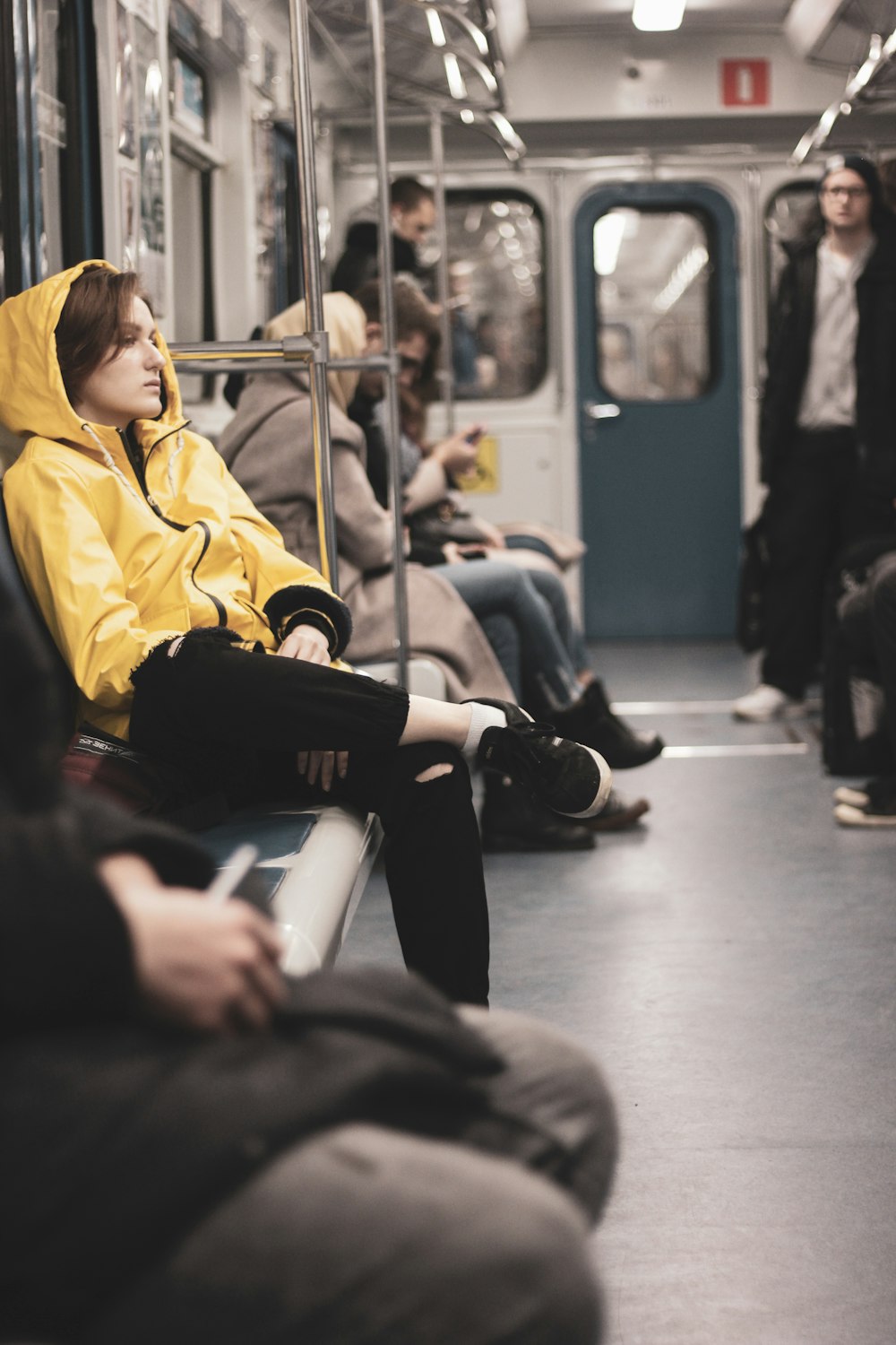 woman sitting on train