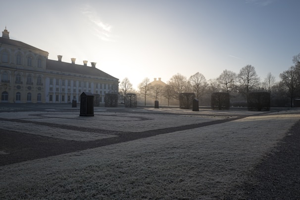 A serene view of the Islamabad Education & Research Centre building bathed in soft morning light.