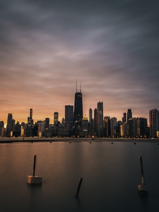 body of water under gray sky