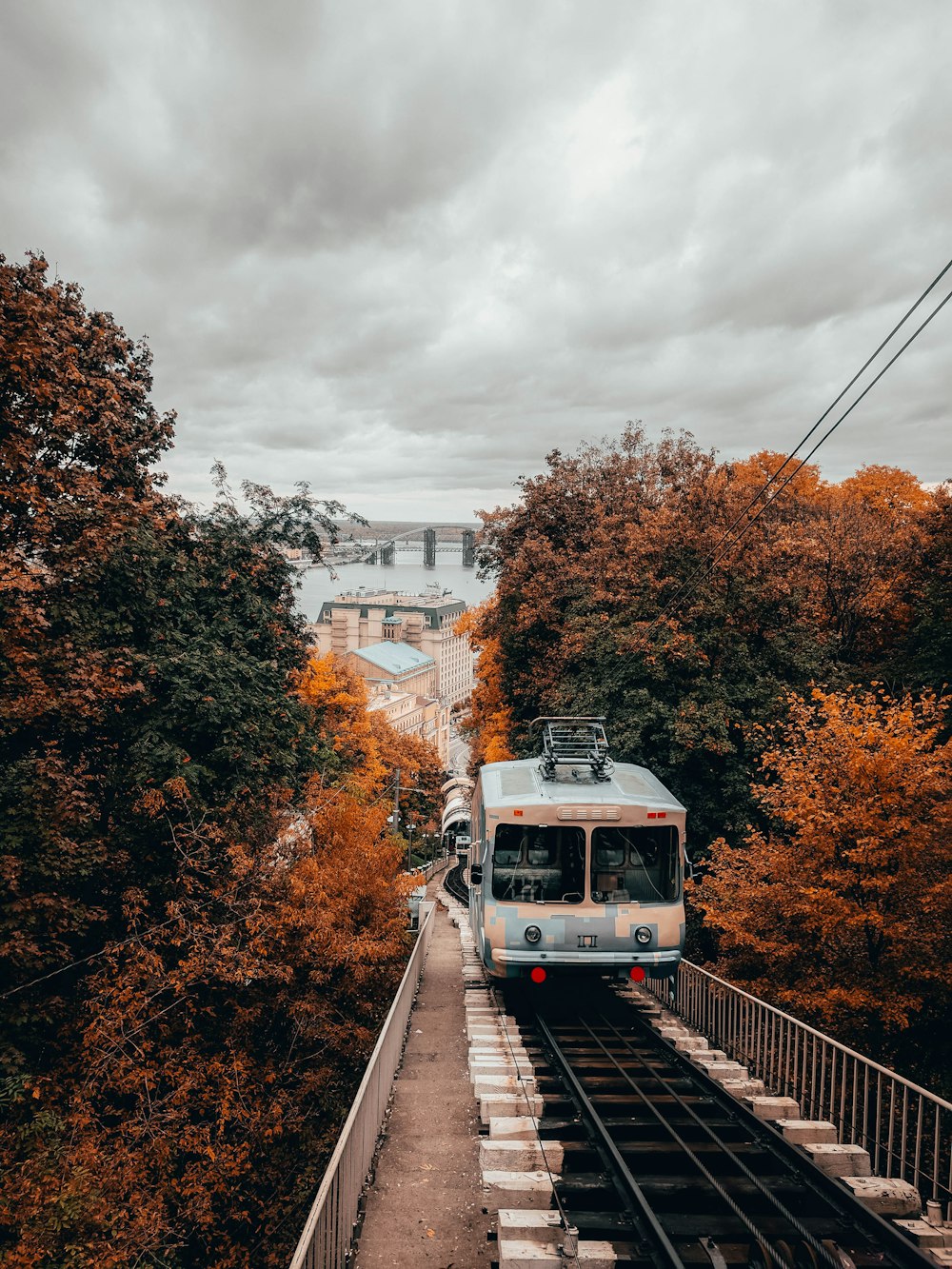 white train on rail