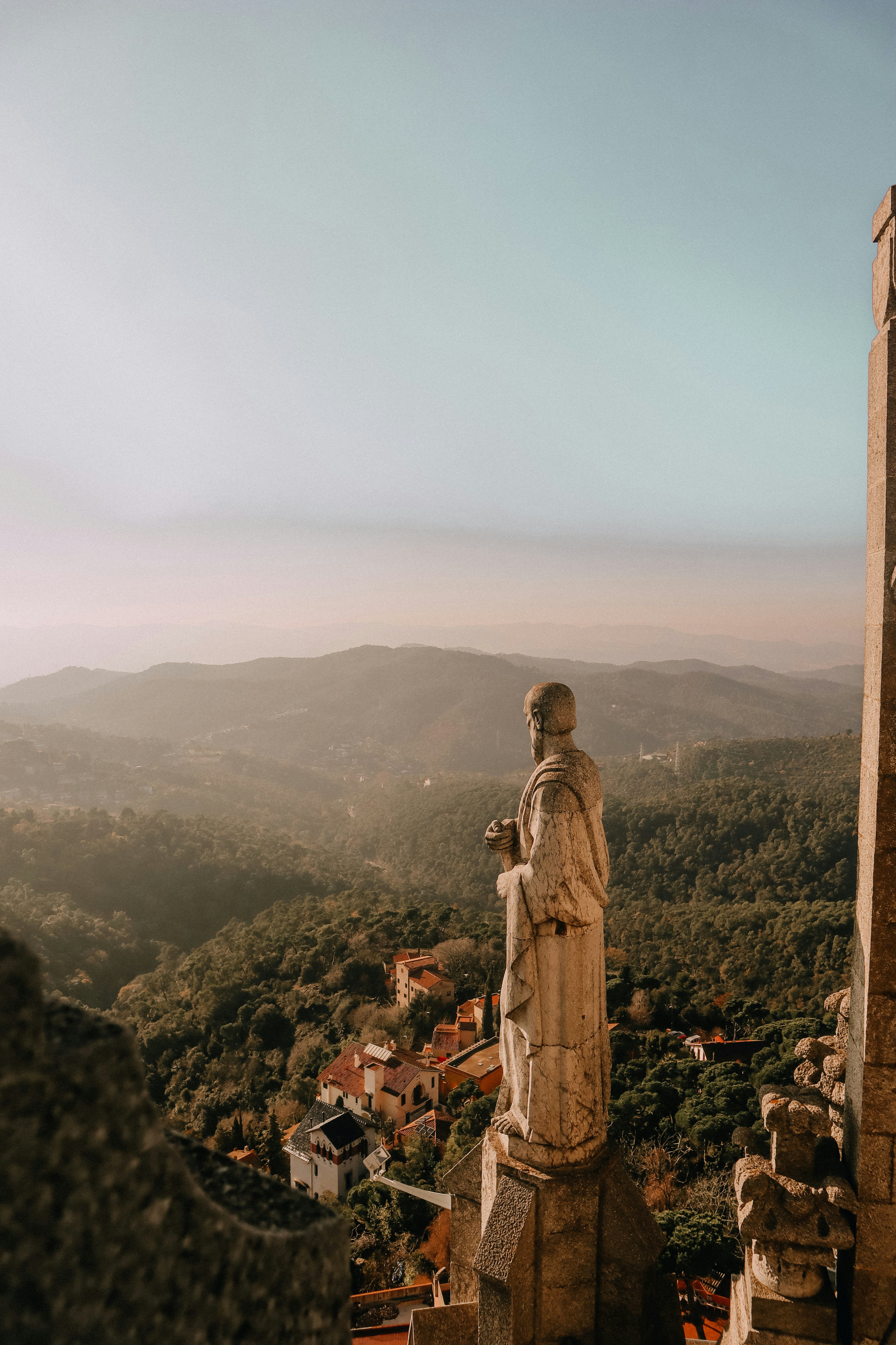 man statue on hill