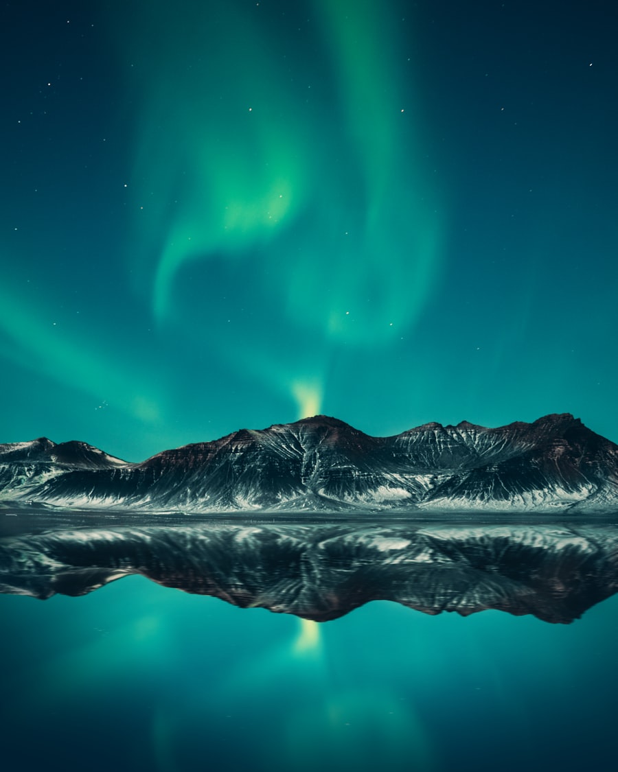 Aurora over a frozen Arctic landscape