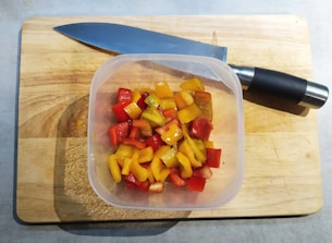 A colorful chopping gadget with sharp blades ready to use.