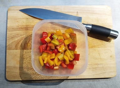 A colorful chopping gadget with sharp blades ready to use.