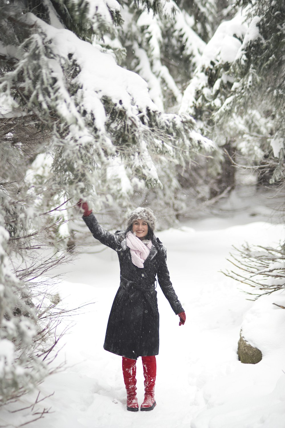 woman standing on snow field