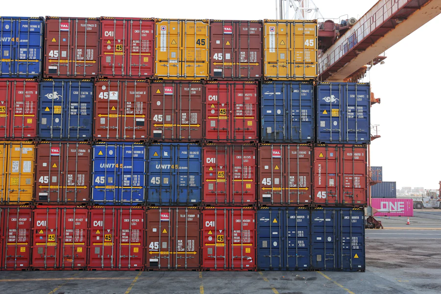 Stacked intermodal shipping containers at a yard during a post-close day one cutover