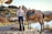 woman near horse