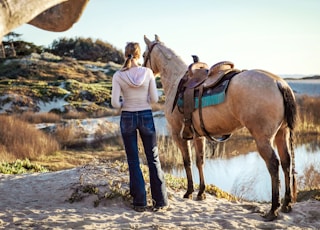 woman near horse