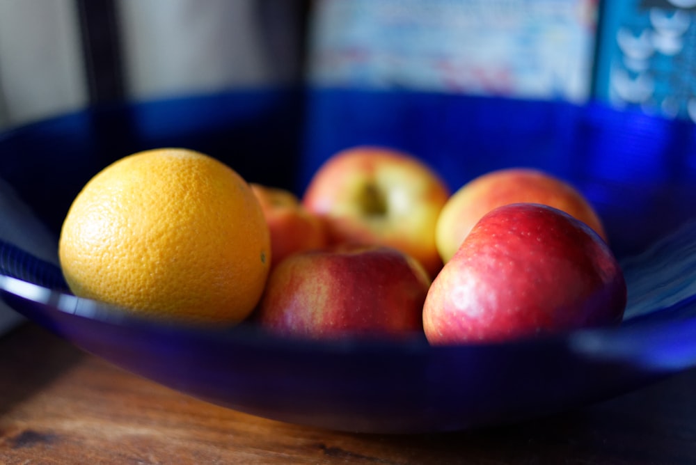 tray of orange and apples