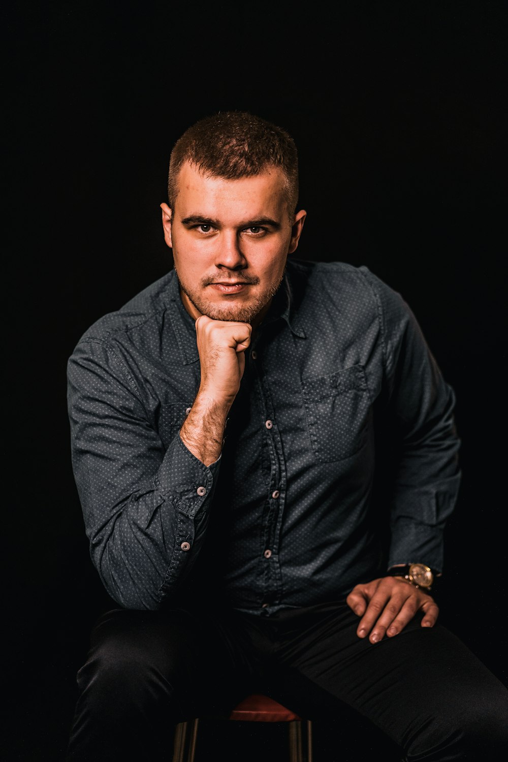 man sitting on chair