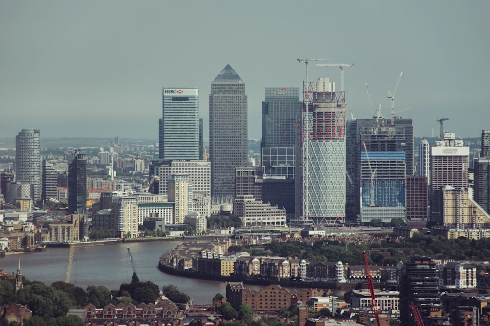 areal photography of buildings near body of water