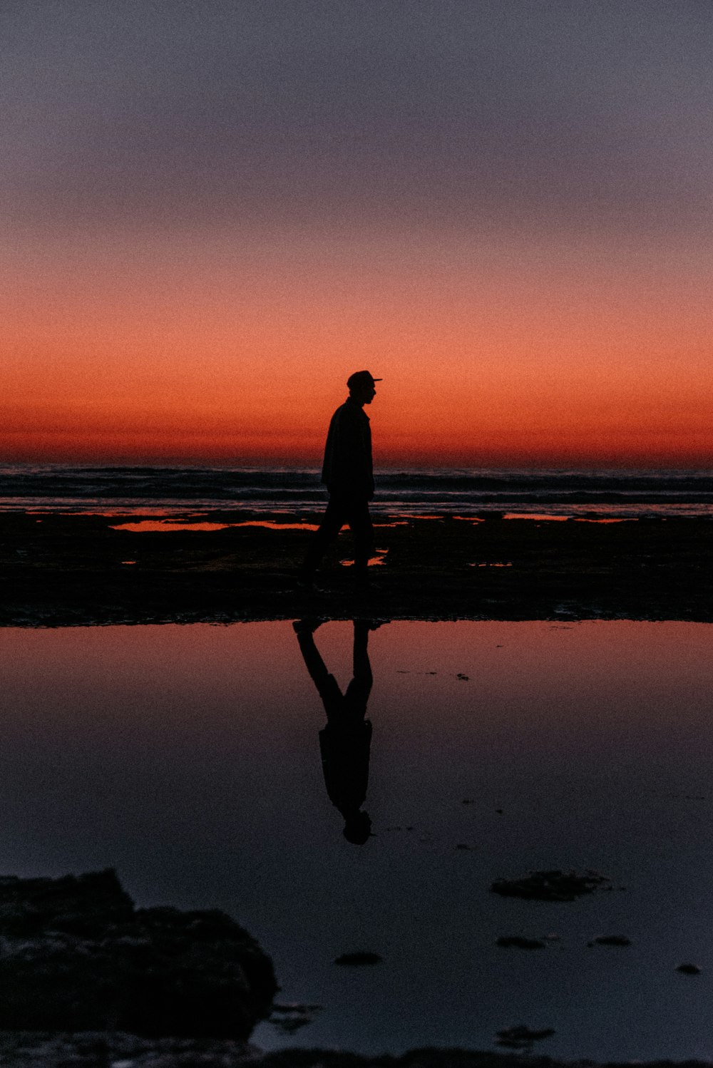 man standing near sea