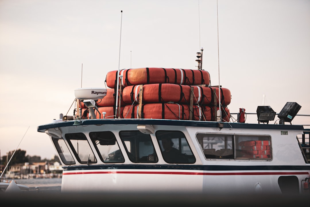 red floating platform on boat