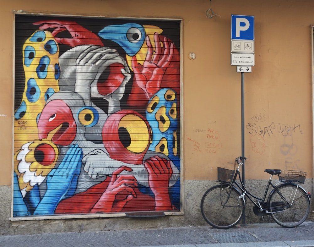 graffiti roller shutter beside city bike park near wall