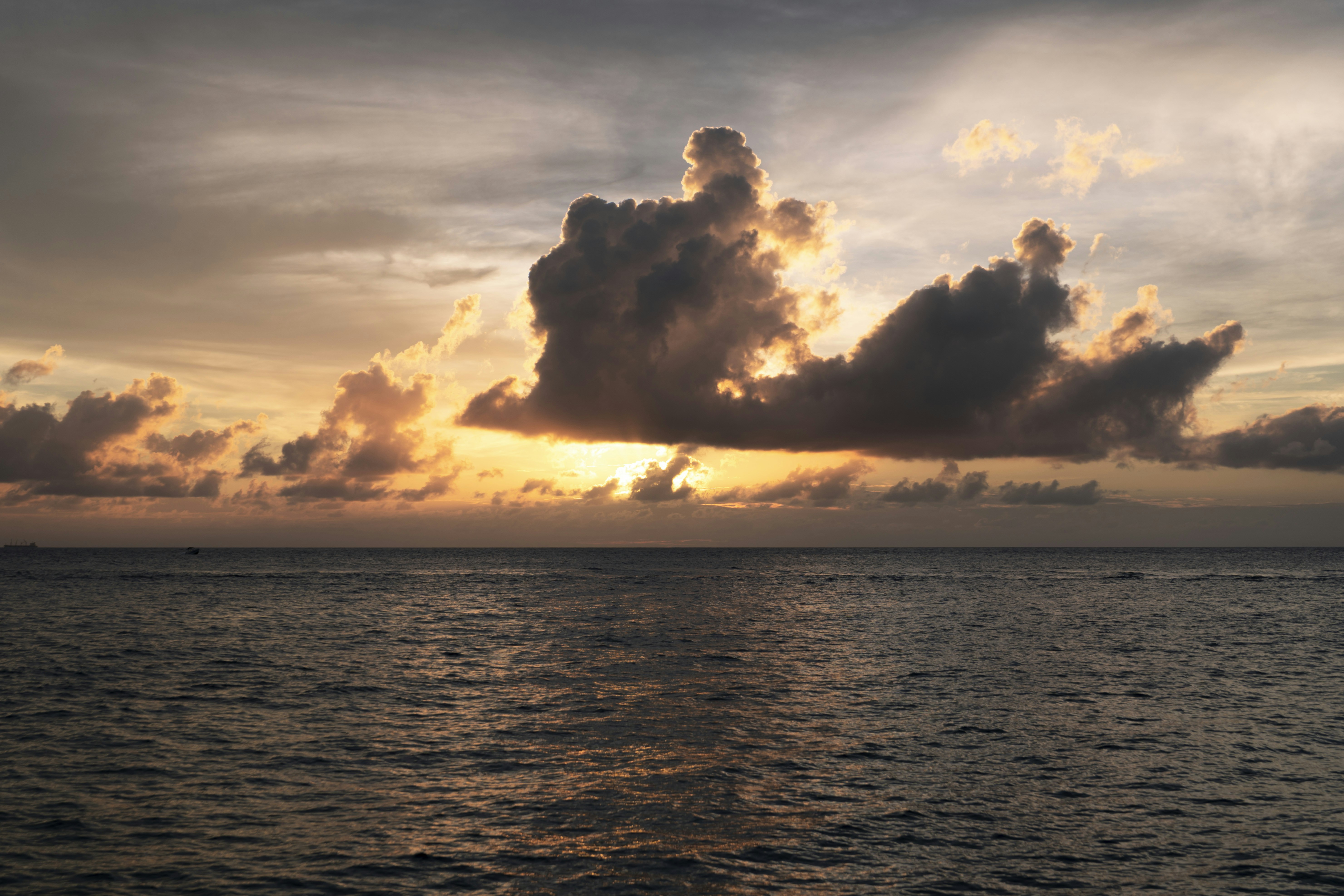 cumulus clouds over sea