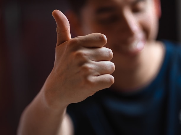 man wearing blue crew-neck shirt