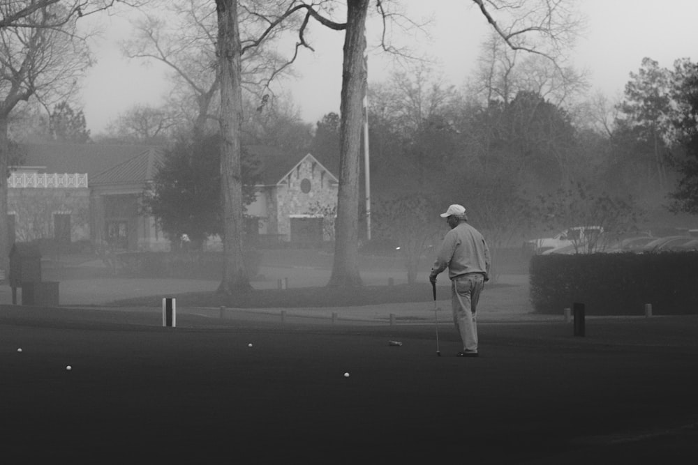 man walking on field