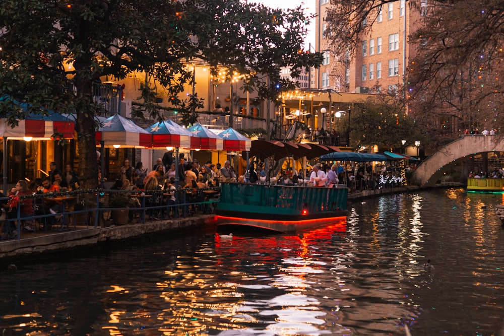 people sitting near body of water