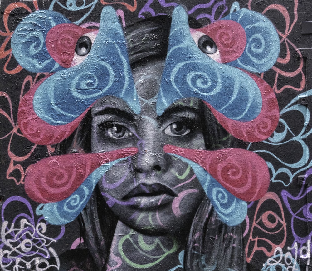 woman's face painted wall