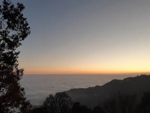 Panoramic view of the sunset blending into the hills surrounding Hadaba