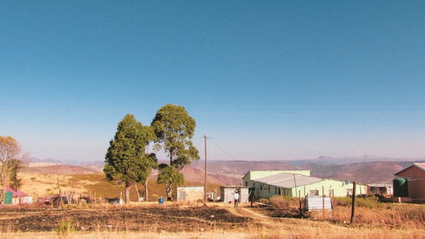 A rural structure receiving a fresh paint job.