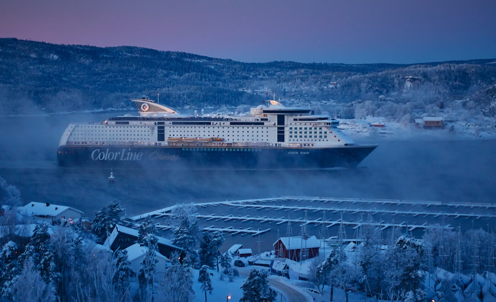 Color Line cruiseferry ship passes marina during winter