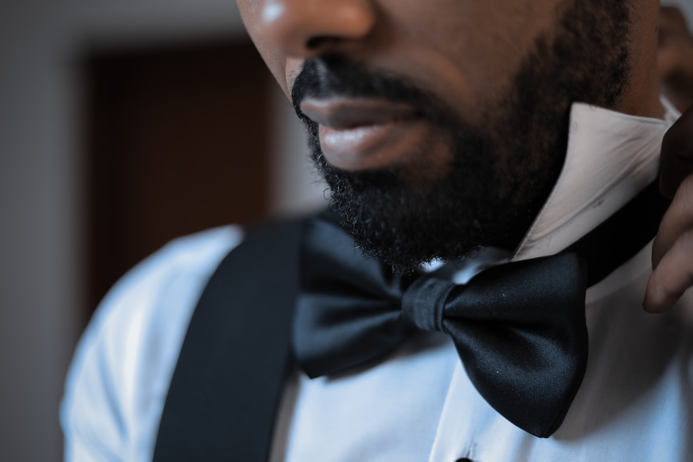 Man in elegant black bow tie ready for formal event