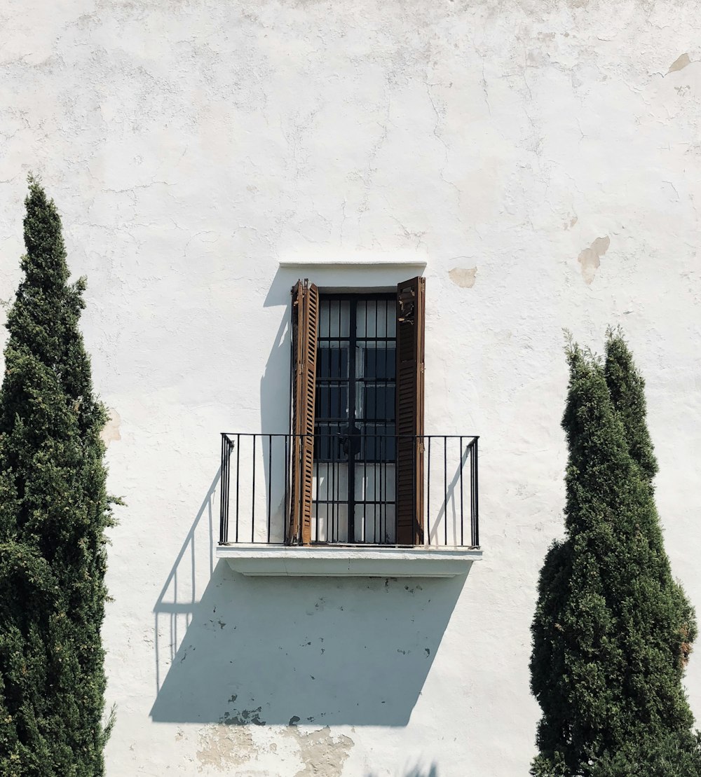 opened brown wooden window