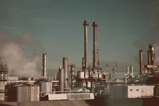 factory under blue and white sky
