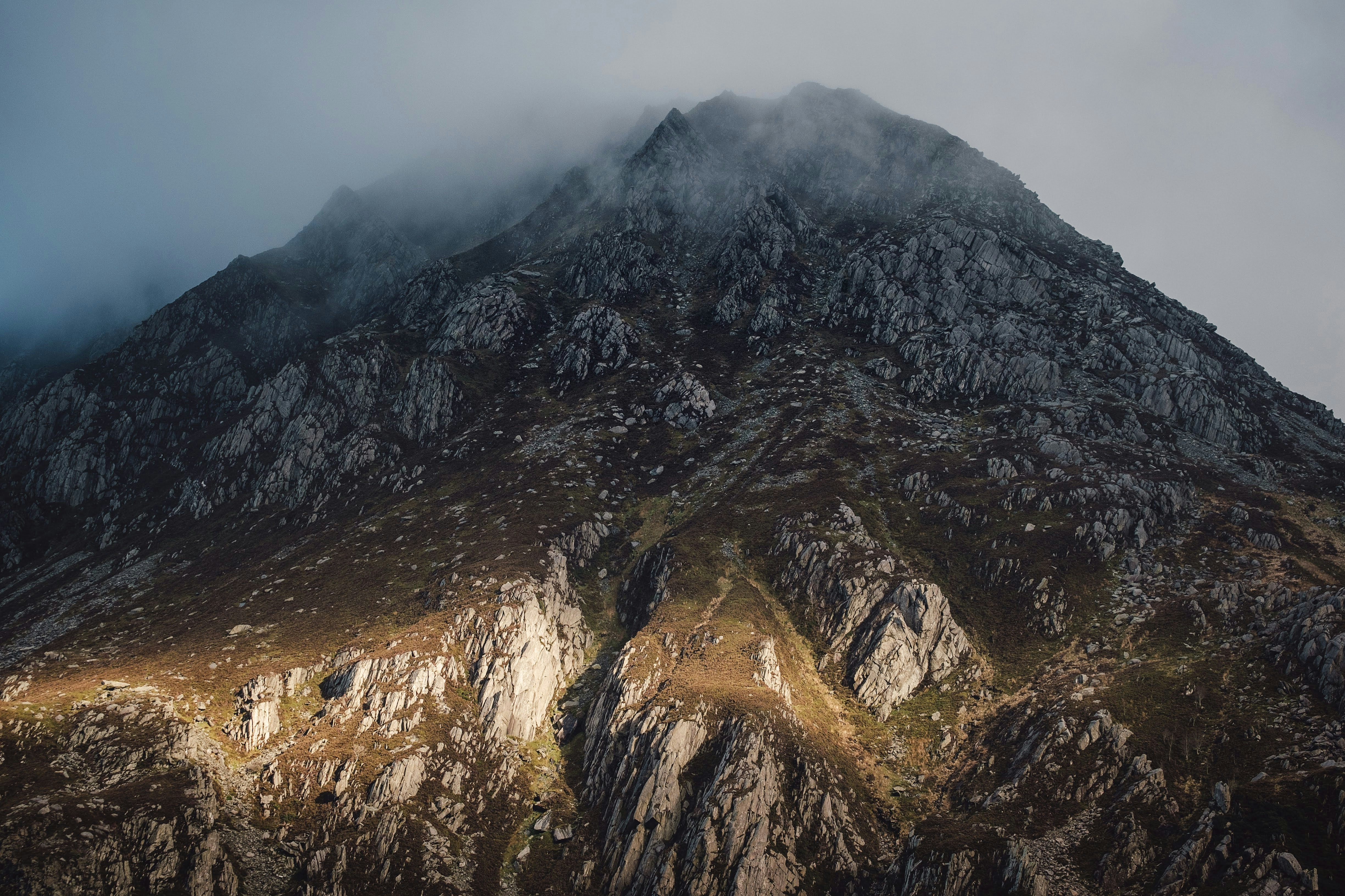 landscape photography of mountain covered with fogs
