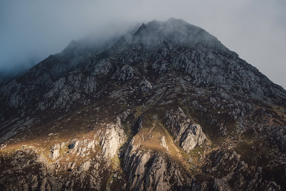 landscape photography of mountain covered with fogs