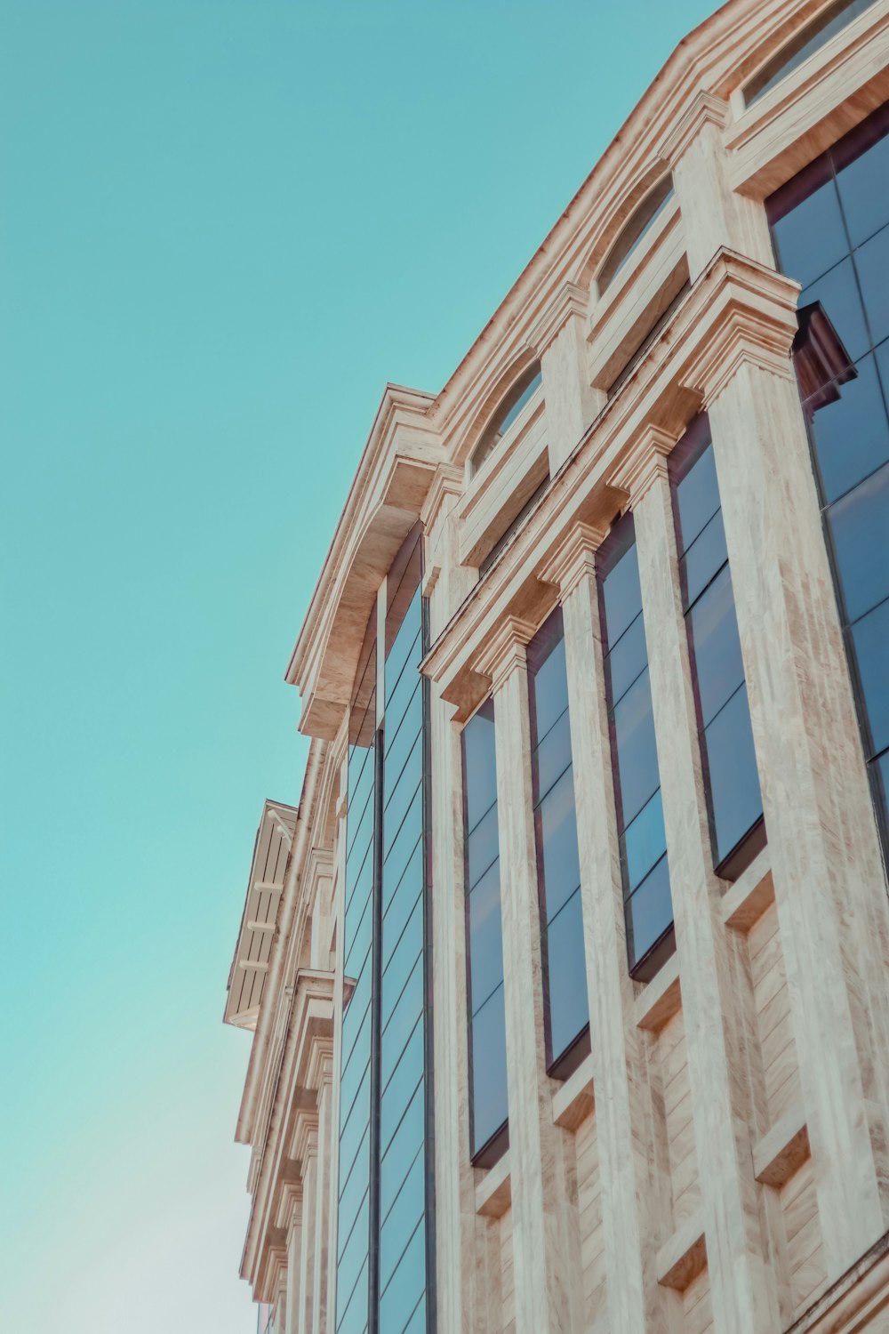 low-angle photography of white building