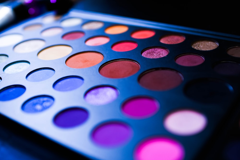 macro photography of multicolored eyeshadow palette