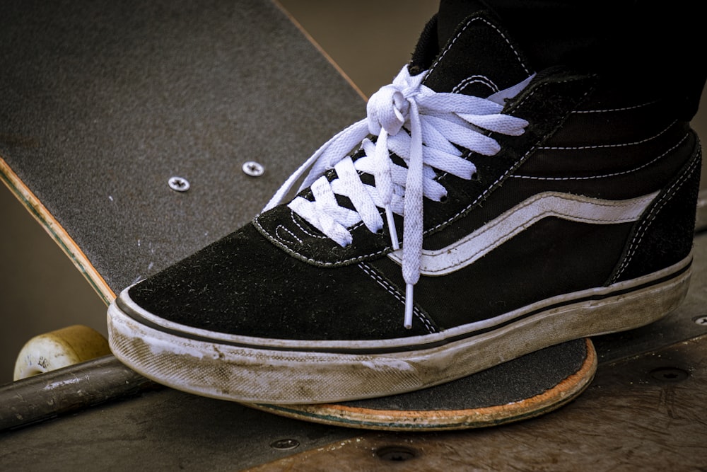 Unpaired white and black Vans Old Skool sneaker photo – Free Nj Image on  Unsplash
