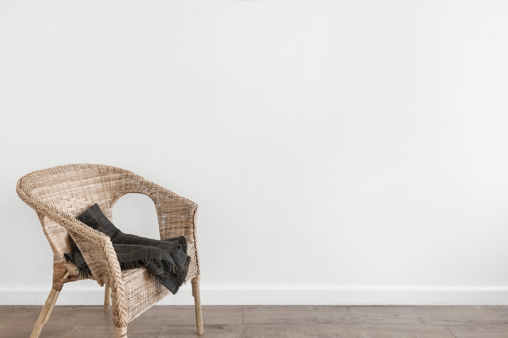 black textile on beige armchair