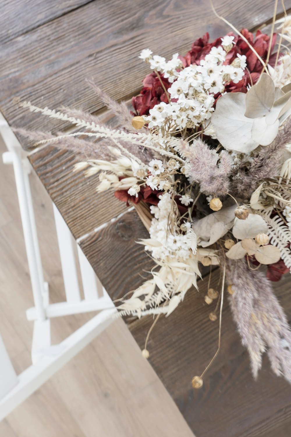 white and red table flower centerpiece