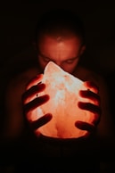 man holding Himalayan lamp halotherapy salt therapy active salt