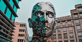 a statue of a man in front of a building