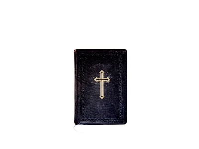 A black book with a gold cross on its cover is centered against a plain, white background. The book appears to have a textured surface, and the cross design is simple and prominent.
