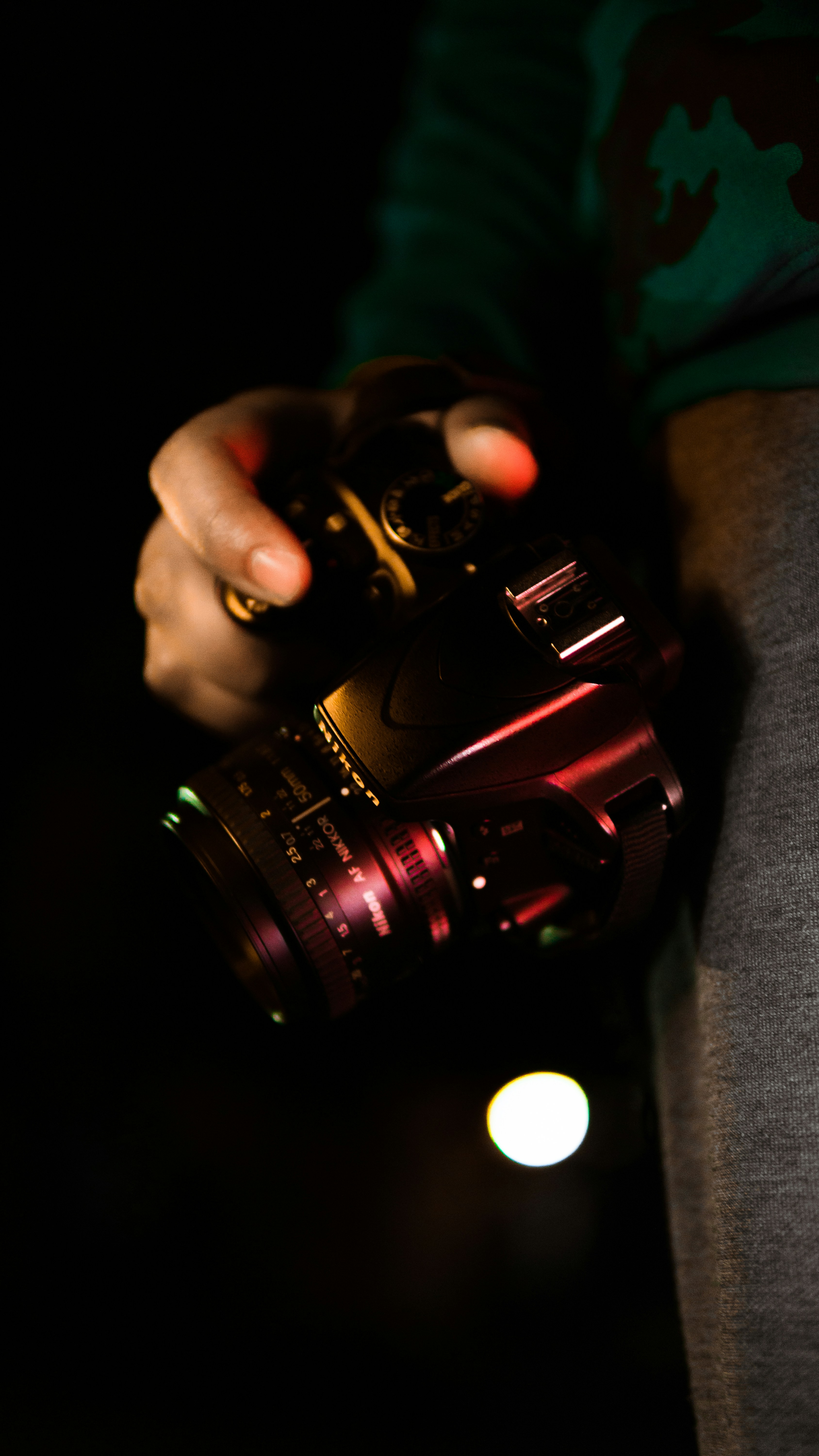 a person holding a camera in their hands