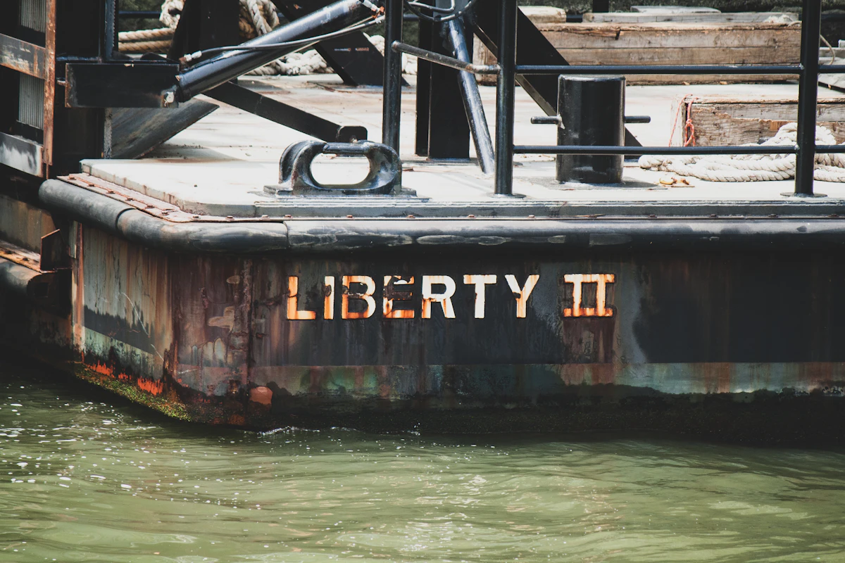 Coral-encrusted historic USAT Liberty shipwreck in warm coastal waters