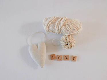 Variety of love knots displayed neatly on a minimalist white background