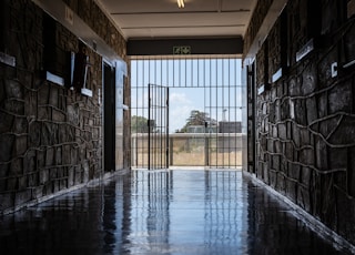 hallway with opened gate during day