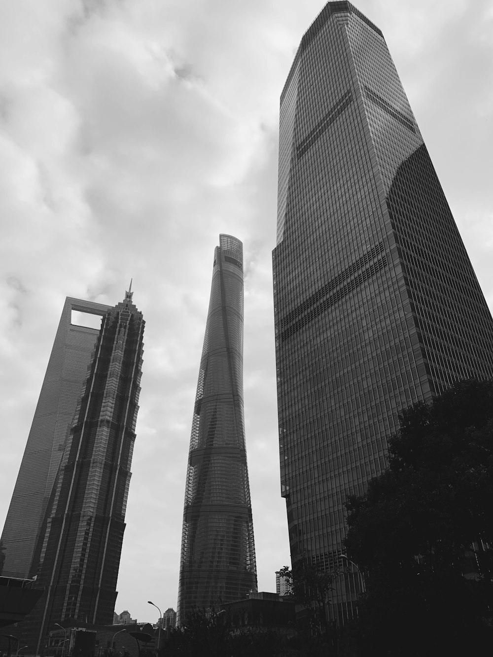 grayscale photo of high-rise buildings