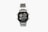 A silver digital wristwatch with a rectangular face displaying the time, world time map, and additional features. The watch has a metal strap and a robust, classic design.